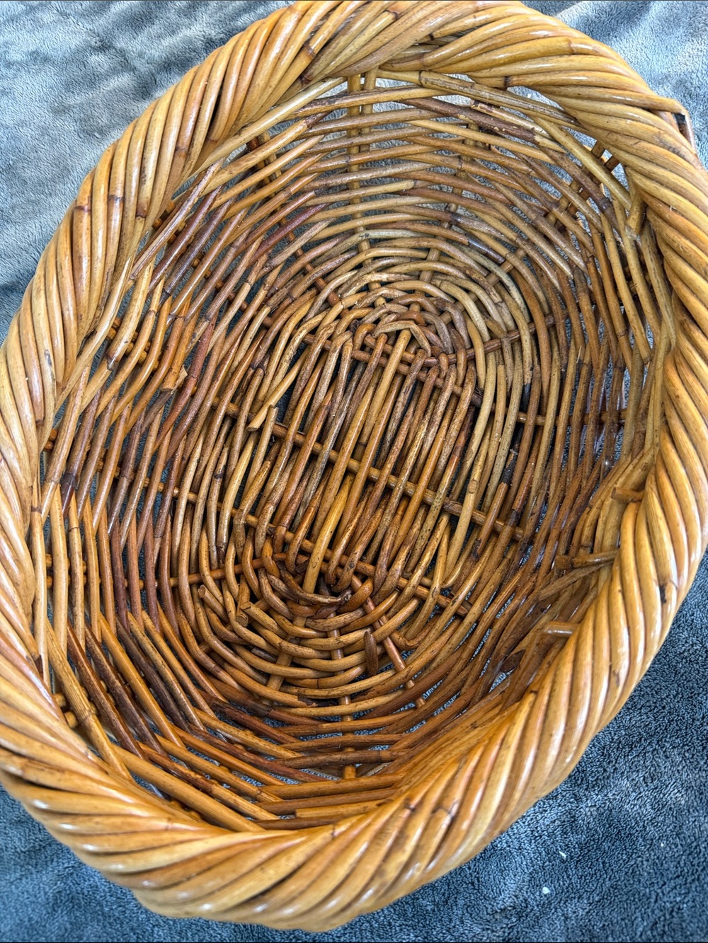 Handwoven Natural Wicker Storage Basket Rustic in warm tones of brown, tan.